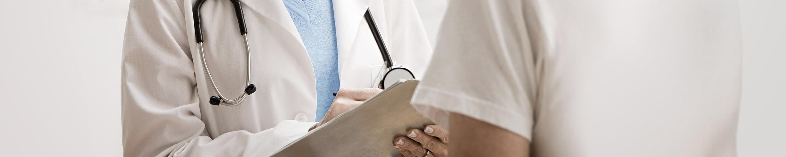 A doctor and his patient having a conversation.