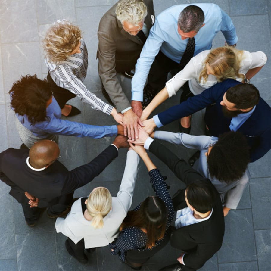 A team stands in a circle