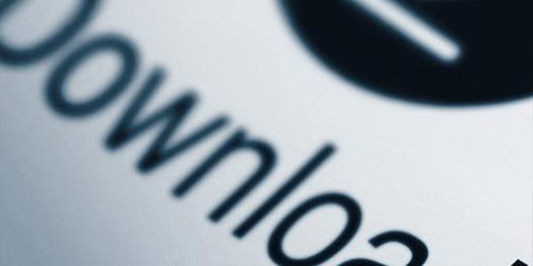 Une touche de clavier d'ordinateur portant le mot Download.