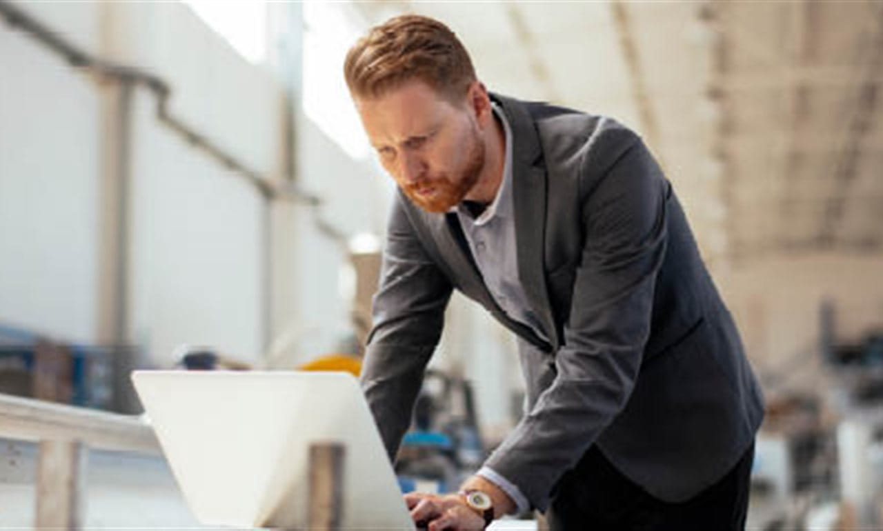 Man looking something in a tablet Man looking something in a tablet