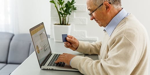 Man sitting in front of laptop