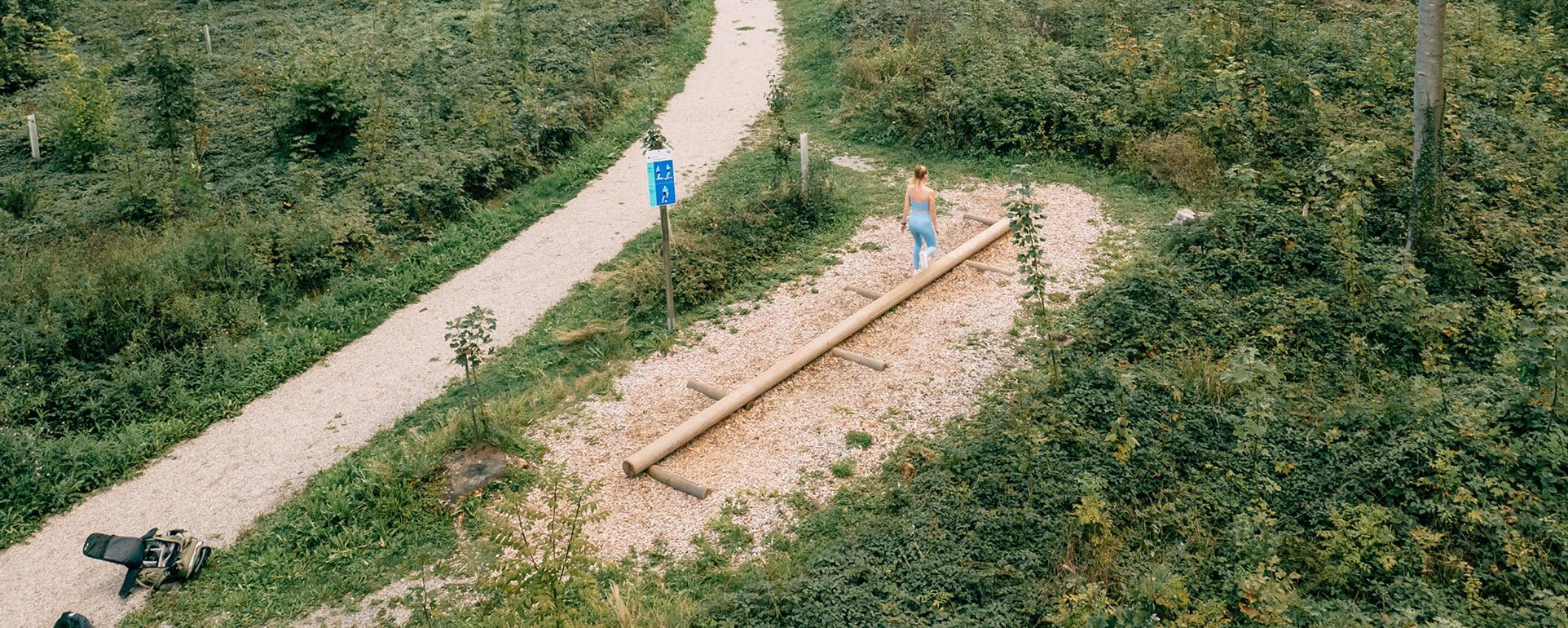 Woman is training on Zurich vitaparcours Woman is training on Zurich vitaparcours