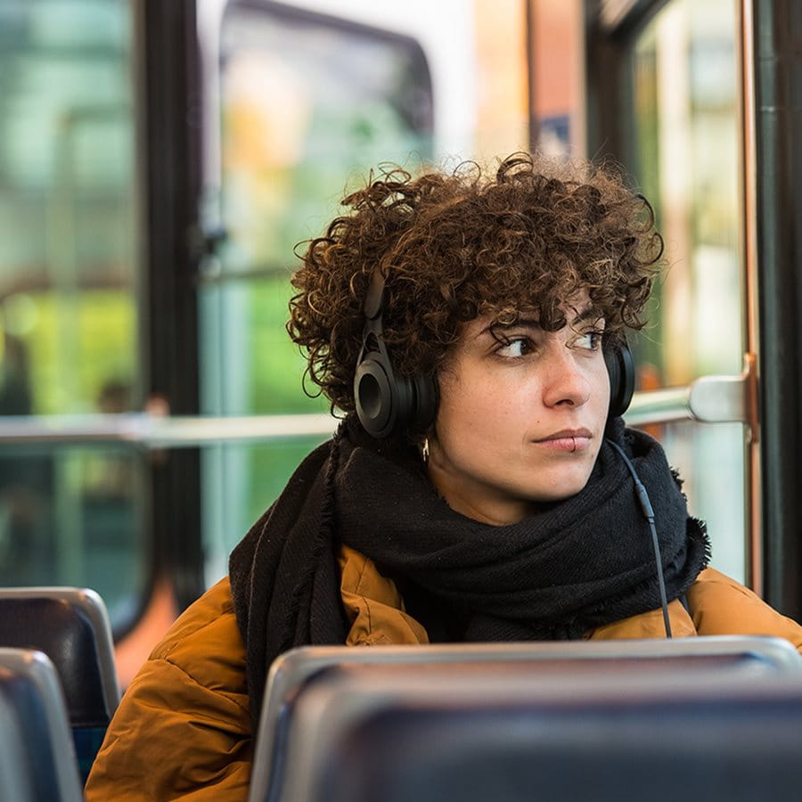 Woman sitting in the tram