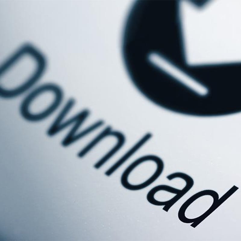 Eine Computertaste mit dem Wort Download.